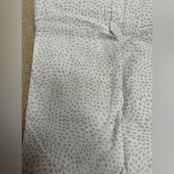 Set of 3 HALO bassinet fitted sheets. One of them has a stain.